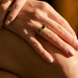 emerald ring on hand